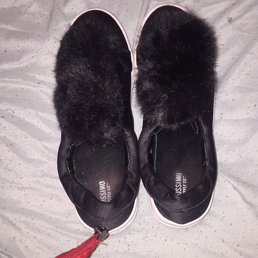 Black and white puff ball shoes